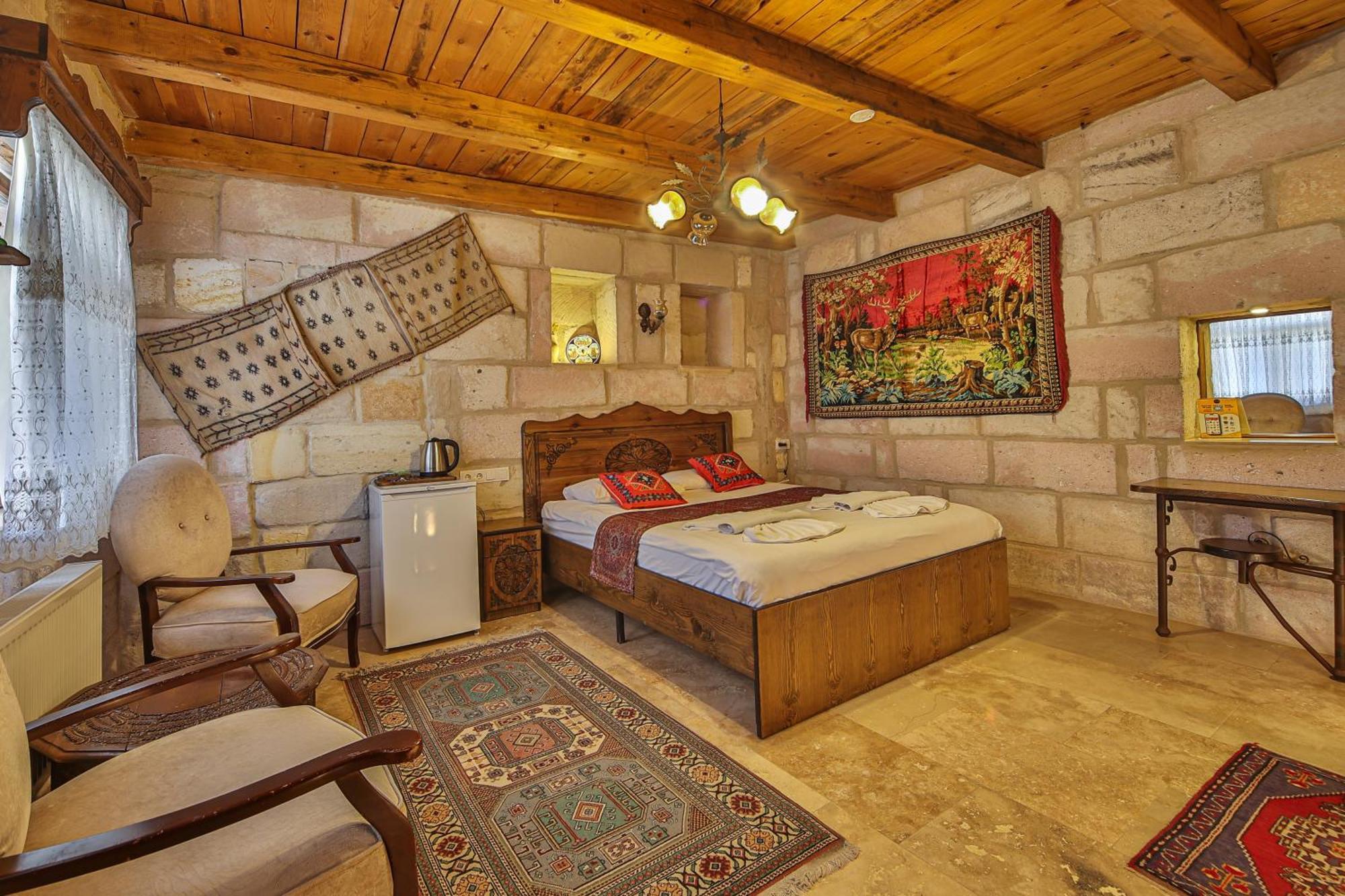 Отель Luwian Stone House Гореме Номер фото