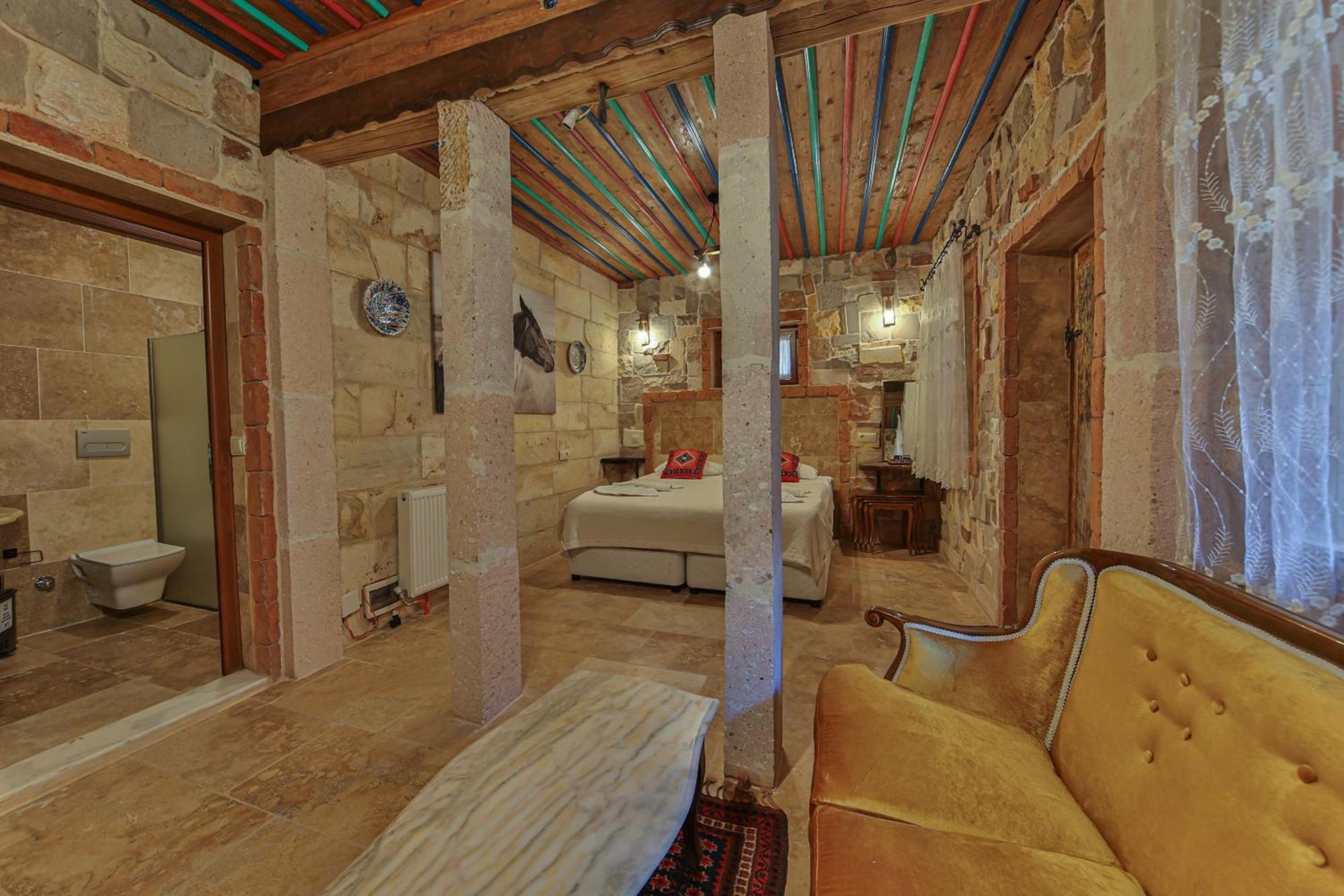 Отель Luwian Stone House Гореме Номер фото